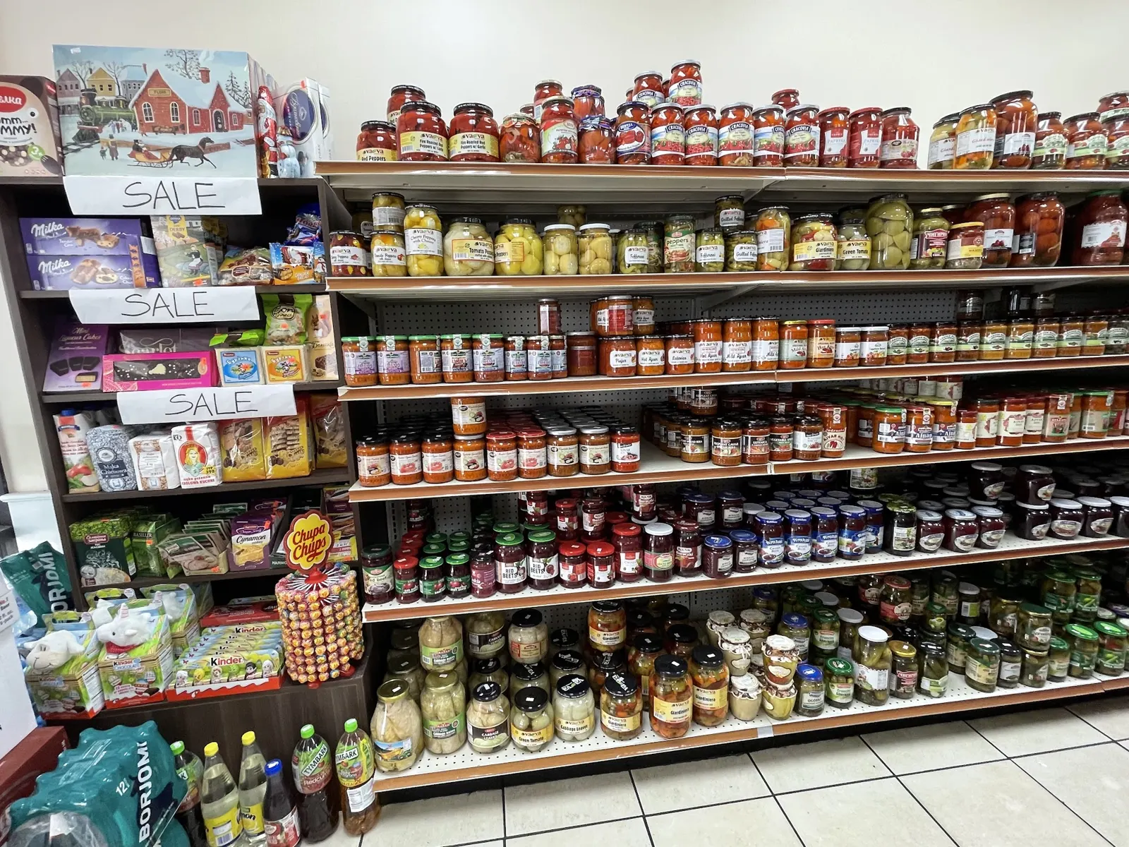 Shelves of imported jars, pickles and preserves